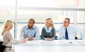 Job interview. Group of businesspeople having a meeting.